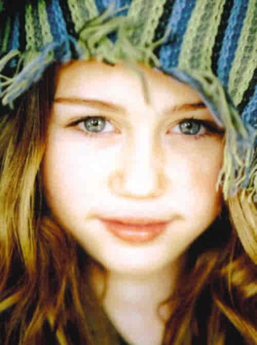 http://i99.photobucket.com/albums/l297/Annyss_Althea/This_Is_Miley_Cyrus--large-msg-1156.jpg