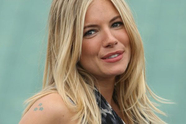 Sienna Miller has several small and girly tattoos, including a lip stain on 